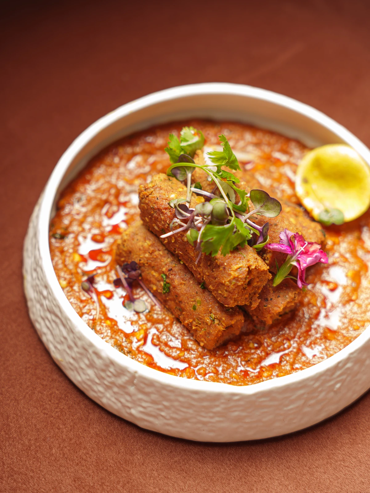 Croquettes in a red curry