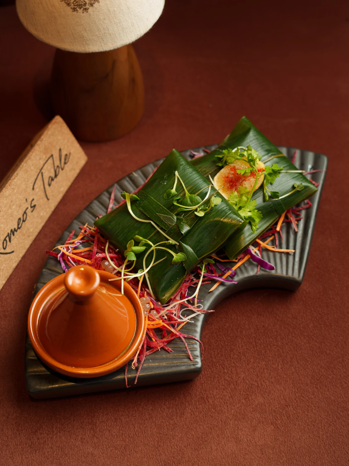 Fish wrapped in banana leaf